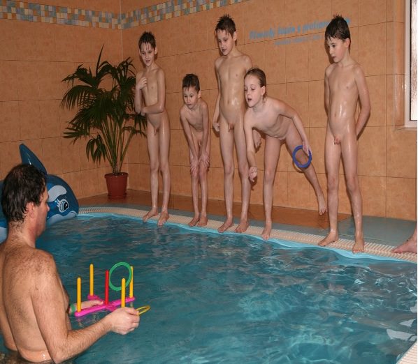 Adults and young nudists in a sauna [WorldNudism]