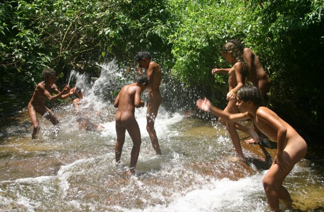 Young nudists of Brazil bathe in the mountain small river [WorldNudism]