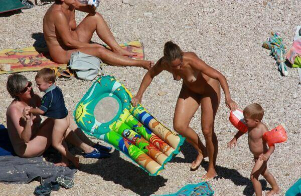 Family bare rest on the Mediterranean Sea [WorldNudism]