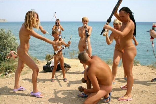 Nudists on a beach play Indians [WorldNudism]