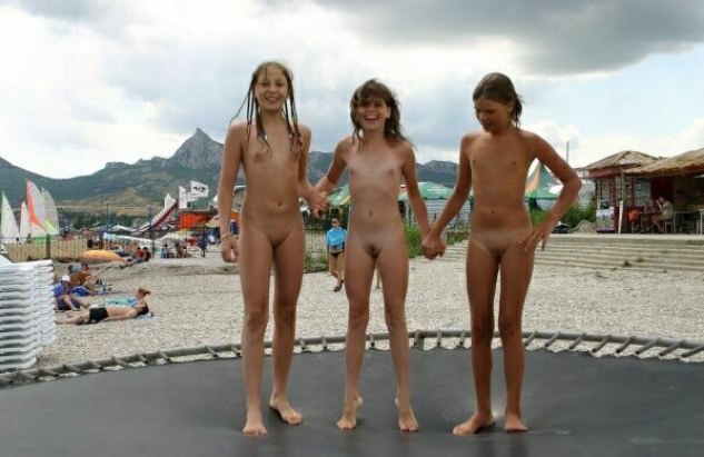 Family nudism - little girls nudists on a trampoline [WorldNudism]