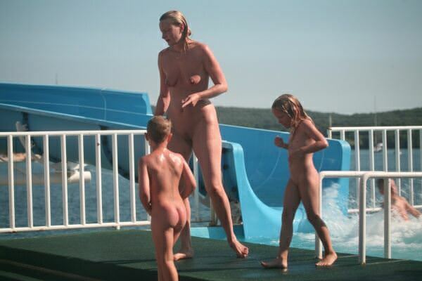 Photos about a family nudism in an aquapark [WorldNudism]